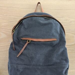 Classic Gray Canvas Men's Backpack with Brown Trim